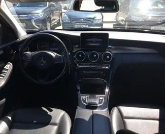 Mercedes-Benz C180 2016 disponibile per il noleggio all'aeroporto di Simferopol, con limite di chilometraggio di illimitato.