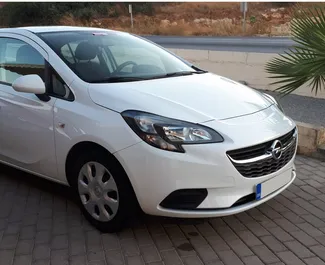 Vista frontale di un noleggio Opel Corsa a Rodi, Grecia ✓ Auto #1482. ✓ Cambio Manuale TM ✓ 0 recensioni.
