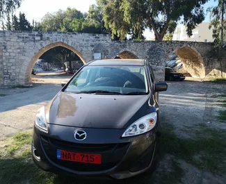 Vista frontale di un noleggio Mazda Premacy a Limassol, Cipro ✓ Auto #839. ✓ Cambio Automatico TM ✓ 0 recensioni.