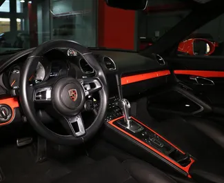 Noleggio Porsche 718 Boxster S. Auto Premium, Lusso, Cabrio per il noleggio negli Emirati Arabi Uniti ✓ Cauzione di Deposito di 5000 AED ✓ Opzioni assicurative RCT, CDW.