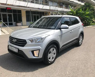 Vista frontale di un noleggio Hyundai Creta in Adler, Russia ✓ Auto #1930. ✓ Cambio Automatico TM ✓ 0 recensioni.