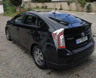 Noleggio auto Toyota Prius 2012 in Georgia, con carburante Ibrido e 134 cavalli di potenza ➤ A partire da 63 GEL al giorno.