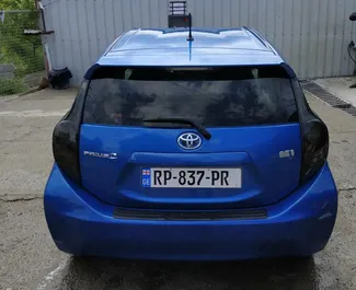 Noleggio auto Toyota Prius C 2013 in Georgia, con carburante Ibrido e 73 cavalli di potenza ➤ A partire da 75 GEL al giorno.