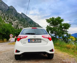 Noleggio Toyota Yaris. Auto Economica, Comfort per il noleggio in Montenegro ✓ Cauzione di Deposito di 100 EUR ✓ Opzioni assicurative RCT, CDW, SCDW, Passeggeri, Furto, All'estero.