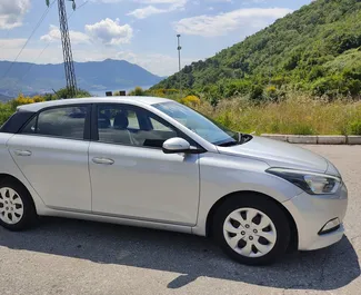Noleggio auto Hyundai i20 2015 in Montenegro, con carburante Benzina e 74 cavalli di potenza ➤ A partire da 24 EUR al giorno.
