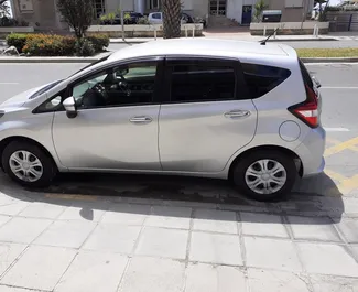 Vista frontale di un noleggio Nissan Note a Limassol, Cipro ✓ Auto #2048. ✓ Cambio Automatico TM ✓ 1 recensioni.