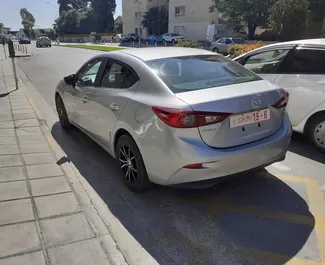 Noleggio Mazda Axela. Auto Comfort, Premium per il noleggio a Cipro ✓ Cauzione di Deposito di 450 EUR ✓ Opzioni assicurative RCT, CDW, Giovane.