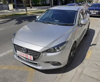 Vista frontale di un noleggio Mazda Axela a Limassol, Cipro ✓ Auto #2050. ✓ Cambio Automatico TM ✓ 0 recensioni.