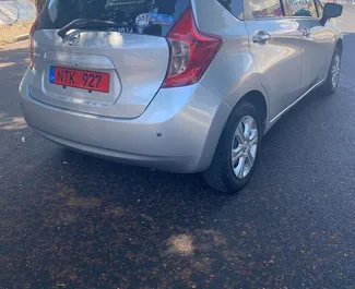 Noleggio auto Nissan Note 2016 a Cipro, con carburante Benzina e 88 cavalli di potenza ➤ A partire da 20 EUR al giorno.