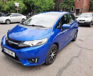 Noleggio auto Honda Fit 2015 in Georgia, con carburante Benzina e 117 cavalli di potenza ➤ A partire da 100 GEL al giorno.