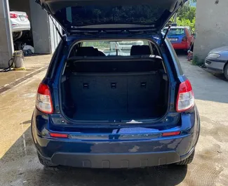 Noleggio Suzuki SX4. Auto Economica, Comfort per il noleggio in Georgia ✓ Cauzione di Deposito di 300 GEL ✓ Opzioni assicurative RCT, CDW, SCDW, All'estero.