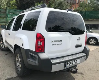 Noleggio auto Nissan X-Terra 2009 in Georgia, con carburante Benzina e 261 cavalli di potenza ➤ A partire da 120 GEL al giorno.