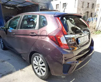 Noleggio Honda Fit. Auto Economica, Comfort per il noleggio in Georgia ✓ Cauzione di Deposito di 500 GEL ✓ Opzioni assicurative RCT, FDW, All'estero.