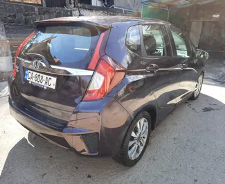 Noleggio auto Honda Fit 2016 in Georgia, con carburante Benzina e 117 cavalli di potenza ➤ A partire da 100 GEL al giorno.