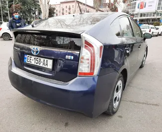 Noleggio auto Toyota Prius 2013 in Georgia, con carburante Ibrido e 117 cavalli di potenza ➤ A partire da 140 GEL al giorno.