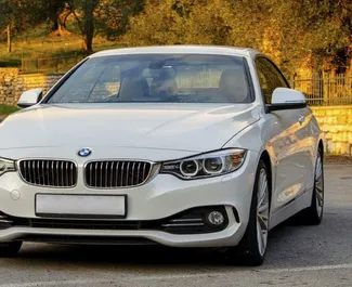 Vista frontale di un noleggio BMW 428i Cabrio in Becici, Montenegro ✓ Auto #2476. ✓ Cambio Automatico TM ✓ 0 recensioni.