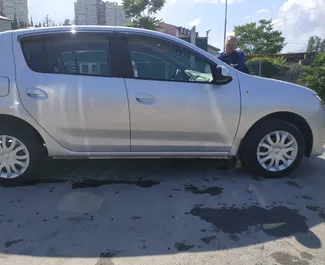 Noleggio auto Renault Sandero 2015 in Crimea, con carburante Benzina e 82 cavalli di potenza ➤ A partire da 1121 RUB al giorno.