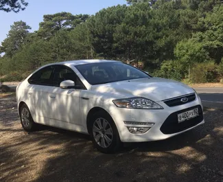 Vista frontale di un noleggio Ford Mondeo a Simferopol, Crimea ✓ Auto #2649. ✓ Cambio Manuale TM ✓ 0 recensioni.