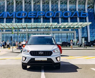 Vista frontale di un noleggio Hyundai Creta all'aeroporto di Simferopol, Crimea ✓ Auto #2643. ✓ Cambio Automatico TM ✓ 0 recensioni.