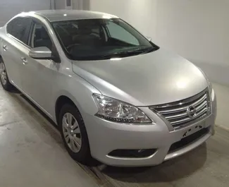 Vista frontale di un noleggio Nissan Sylphy a Paphos, Cipro ✓ Auto #3166. ✓ Cambio Automatico TM ✓ 0 recensioni.