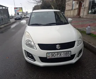 Vista frontale di un noleggio Suzuki Swift a Baku, Azerbaigian ✓ Auto #3638. ✓ Cambio Automatico TM ✓ 2 recensioni.