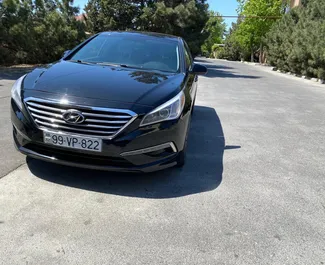 Vista frontale di un noleggio Hyundai Sonata a Baku, Azerbaigian ✓ Auto #3573. ✓ Cambio Automatico TM ✓ 0 recensioni.