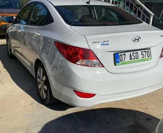 Noleggio auto Hyundai Accent Blue #3810 Automatico all'aeroporto di Antalya, dotata di motore 1,6L ➤ Da Sefa in Turchia.