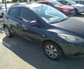 Noleggio auto Mazda Demio 2012 a Cipro, con carburante Benzina e 90 cavalli di potenza ➤ A partire da 31 EUR al giorno.