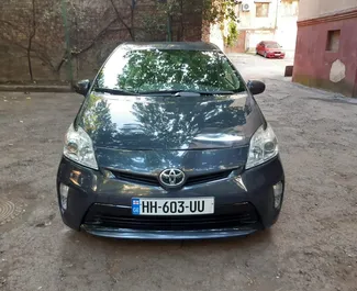 Noleggio auto Toyota Prius 2014 in Georgia, con carburante Ibrido e 134 cavalli di potenza ➤ A partire da 75 GEL al giorno.