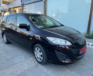 Vista frontale di un noleggio Mazda Premacy a Larnaca, Cipro ✓ Auto #4378. ✓ Cambio Automatico TM ✓ 0 recensioni.