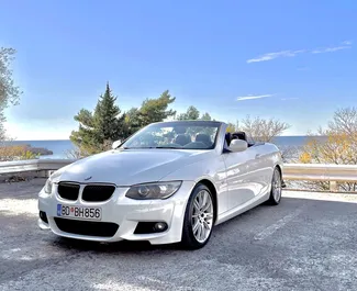 Vista frontale di un noleggio BMW 3-series Cabrio a Budva, Montenegro ✓ Auto #4393. ✓ Cambio Automatico TM ✓ 4 recensioni.