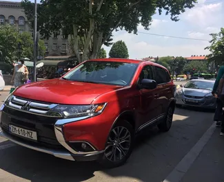 Vista frontale di un noleggio Mitsubishi Outlander a Tbilisi, Georgia ✓ Auto #4423. ✓ Cambio Automatico TM ✓ 0 recensioni.