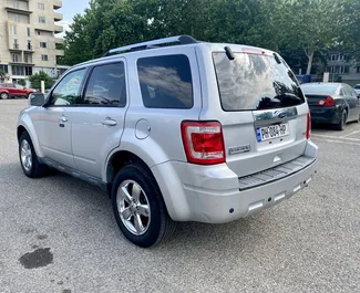 Interni di Ford Escape in affitto in Georgia. Un'ottima auto da 5 posti con cambio Automatico.