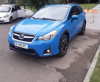 Subaru Crosstrek 2015 disponibile per il noleggio a Tbilisi, con limite di chilometraggio di illimitato.