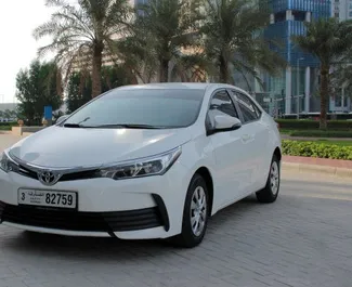 Vista frontale di un noleggio Toyota Corolla Sedan a Dubai, Emirati Arabi Uniti ✓ Auto #4861. ✓ Cambio Automatico TM ✓ 0 recensioni.