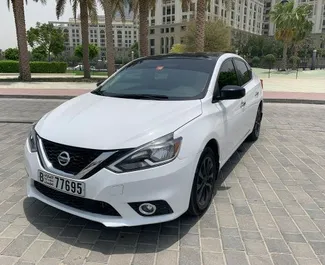 Vista frontale di un noleggio Nissan Sentra a Dubai, Emirati Arabi Uniti ✓ Auto #4864. ✓ Cambio Automatico TM ✓ 0 recensioni.