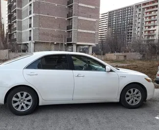 Noleggio auto Toyota Camry 2007 in Georgia, con carburante Ibrido e 150 cavalli di potenza ➤ A partire da 105 GEL al giorno.