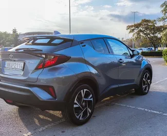 Noleggio auto Toyota C-HR 2022 in Grecia, con carburante Ibrido e 122 cavalli di potenza ➤ A partire da 27 EUR al giorno.