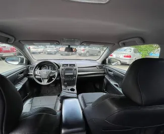 Noleggio Toyota Camry. Auto Comfort, Premium per il noleggio in Georgia ✓ Cauzione di Senza deposito ✓ Opzioni assicurative RCT, Passeggeri, Furto, Giovane.