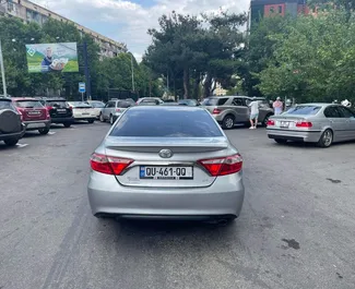 Noleggio auto Toyota Camry 2015 in Georgia, con carburante Benzina e 178 cavalli di potenza ➤ A partire da 85 GEL al giorno.