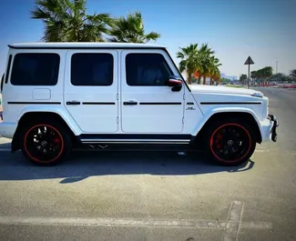 Noleggio Mercedes-Benz G63. Auto Premium, Lusso, SUV per il noleggio negli Emirati Arabi Uniti ✓ Cauzione di Deposito di 5000 AED ✓ Opzioni assicurative RCT.