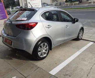 Noleggio auto Mazda 2 2023 a Cipro, con carburante Benzina e 110 cavalli di potenza ➤ A partire da 33 EUR al giorno.