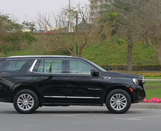 Noleggio auto GMC Yukon 2022 negli Emirati Arabi Uniti, con carburante Benzina e 400 cavalli di potenza ➤ A partire da 500 AED al giorno.