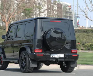 Mercedes-Benz G63 AMG 2023 disponibile per il noleggio a Dubai, con limite di chilometraggio di 250 km/giorno.