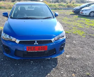 Vista frontale di un noleggio Mitsubishi Lancer a Limassol, Cipro ✓ Auto #6003. ✓ Cambio Automatico TM ✓ 0 recensioni.