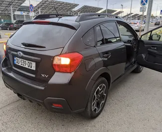 Subaru Crosstrek 2014 disponibile per il noleggio a Tbilisi, con limite di chilometraggio di illimitato.