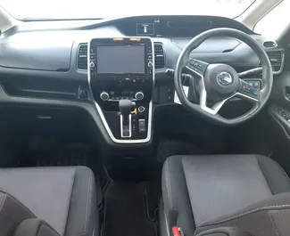 Noleggio auto Nissan Serena 2018 a Cipro, con carburante Ibrido e 120 cavalli di potenza ➤ A partire da 60 EUR al giorno.