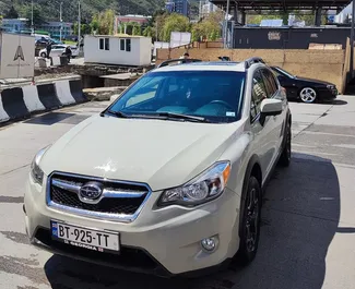 Vista frontale di un noleggio Subaru XV a Tbilisi, Georgia ✓ Auto #6359. ✓ Cambio Automatico TM ✓ 0 recensioni.