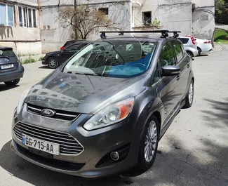 Vista frontale di un noleggio Ford C-Max a Tbilisi, Georgia ✓ Auto #6475. ✓ Cambio Automatico TM ✓ 3 recensioni.