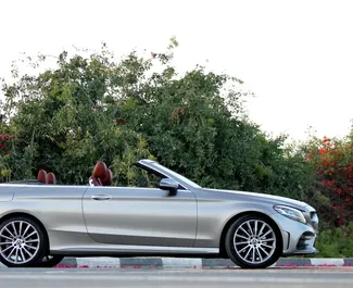 Noleggio auto Mercedes-Benz C300 Cabrio 2020 negli Emirati Arabi Uniti, con carburante Benzina e 255 cavalli di potenza ➤ A partire da 499 AED al giorno.